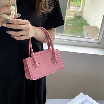 Női PU bőrtáska minimalista mini rózsaszín kis négyzet alakú táska 2023 Új nyugati textúrájú kis táska kézi terpeszke táska